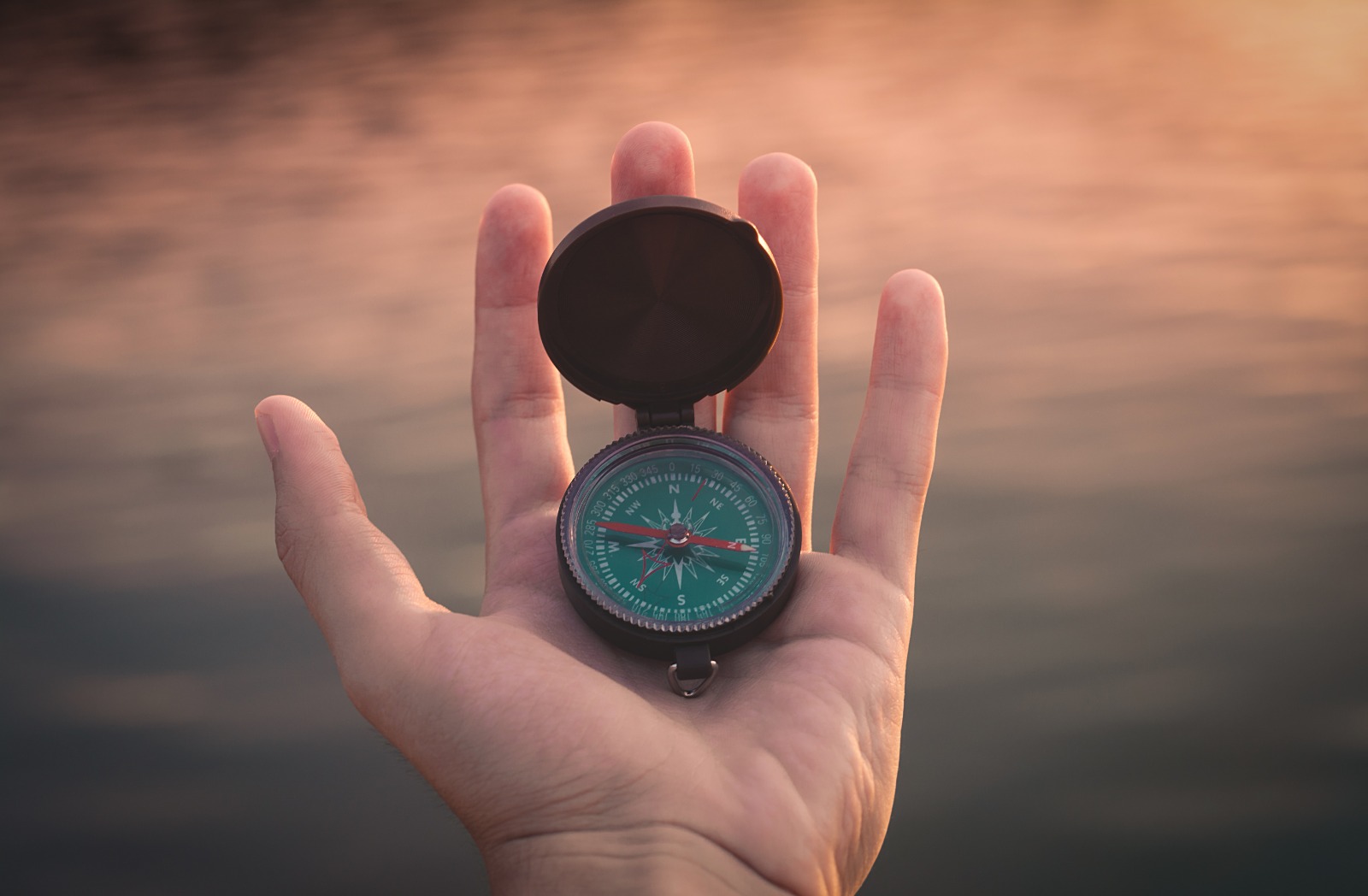 hand-with-compass